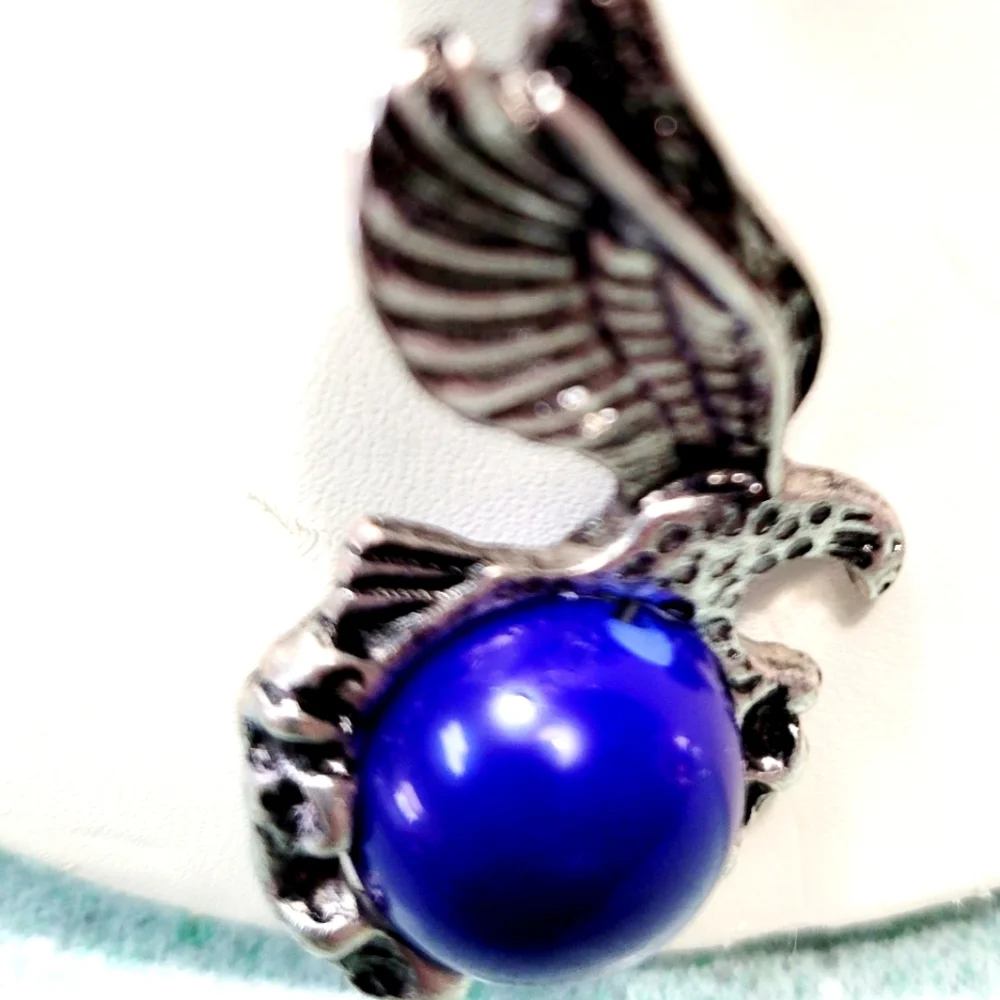 Necklace with Eagle holding a cobalt blue glass orb